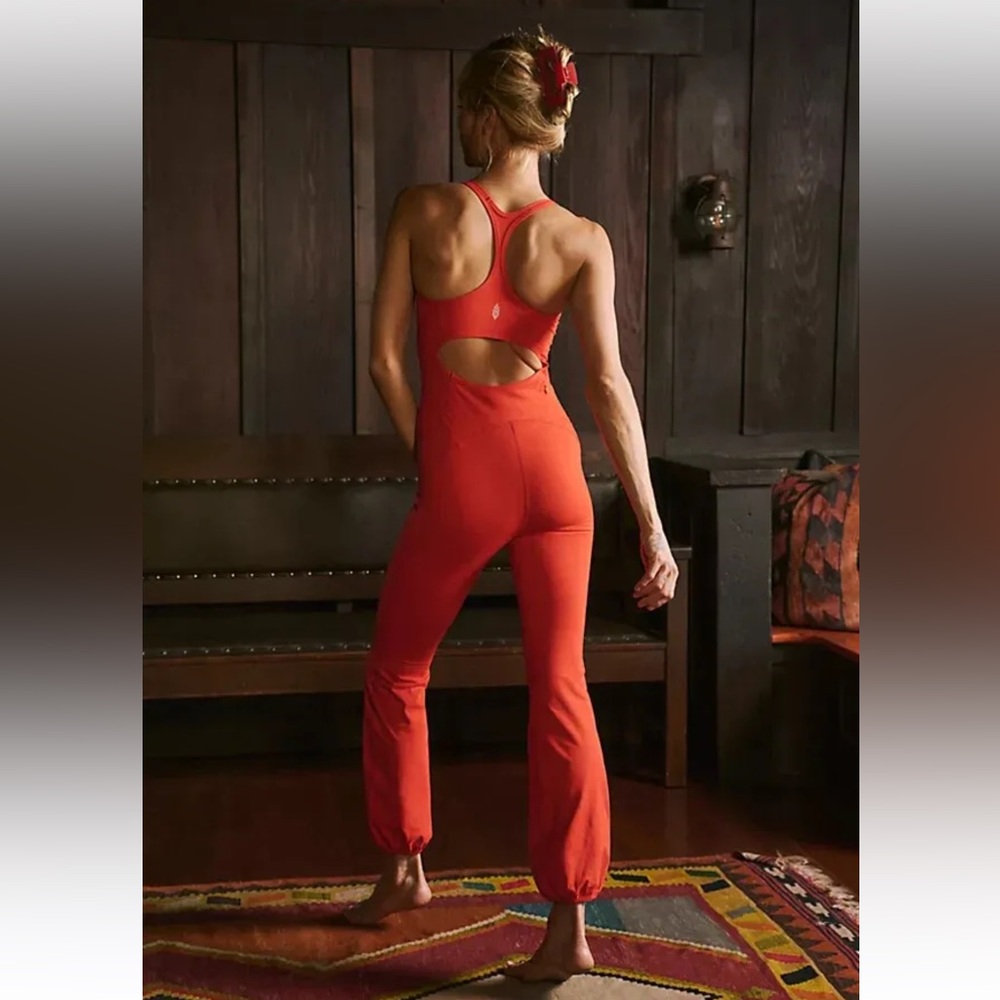 FREE PEOPLE MOVEMENT let’s bounce Onesie Medium Orange